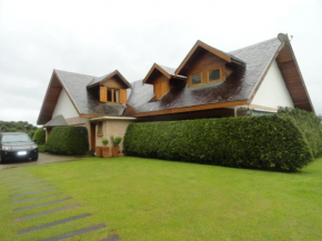 Casa com Quadra de Tenis - Campos do Jordao